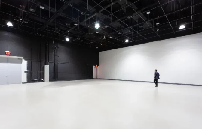 NYU'S NEW SCORCESE FILM PRODUCTION FACILITY AT INDUSTRY CITY WILL EVENTUALLY HAVE LARGE LED SCREENS FOR ACTORS AND DIRECTORS TO SEE HOW THEY INTERACT WITH COMPUTER GENERATED GRAPHICS IN REAL TIME.